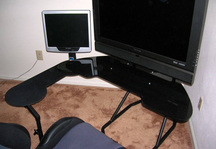 Obutto oZone Gaming Cockpit - the keyboard/mouse tray used for a small secondary monitor
