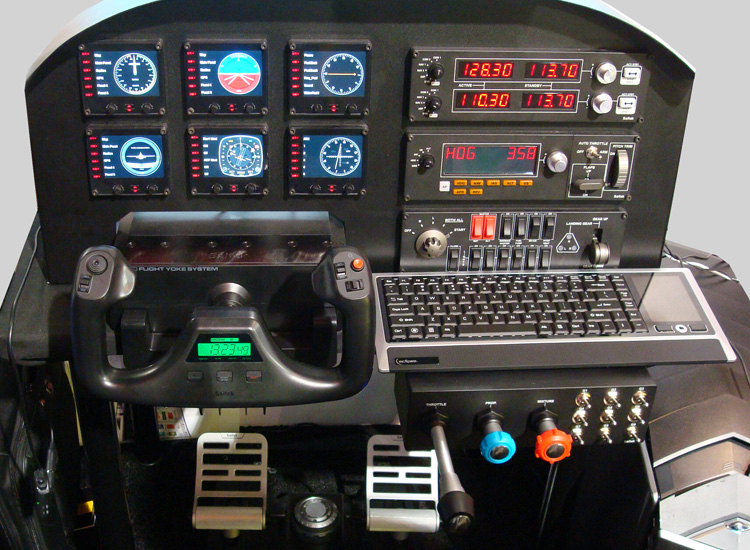 A smaller configuration of the Saitek ProFlight panels, yoke, Litetouch keyboard, TPM, and new pedals