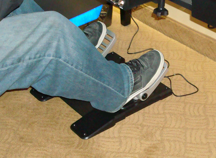 Pro Flight Combat rudder pedals with heels resting on plate